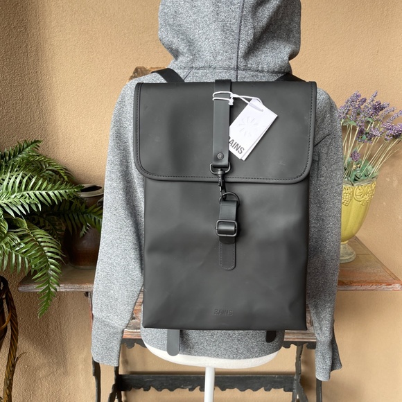NEW! Rains Black Slim Line Adjustable Backpack. New With Tags.